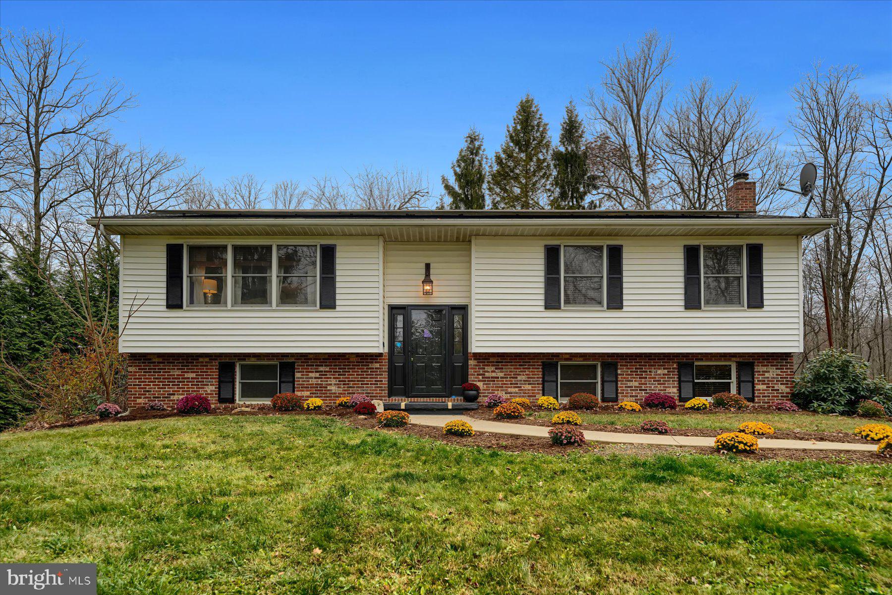 768 Dry Hollow Road Warriors Mark, PA 16877 - Photo 4 of 56 a view of a house with backyard and sitting area