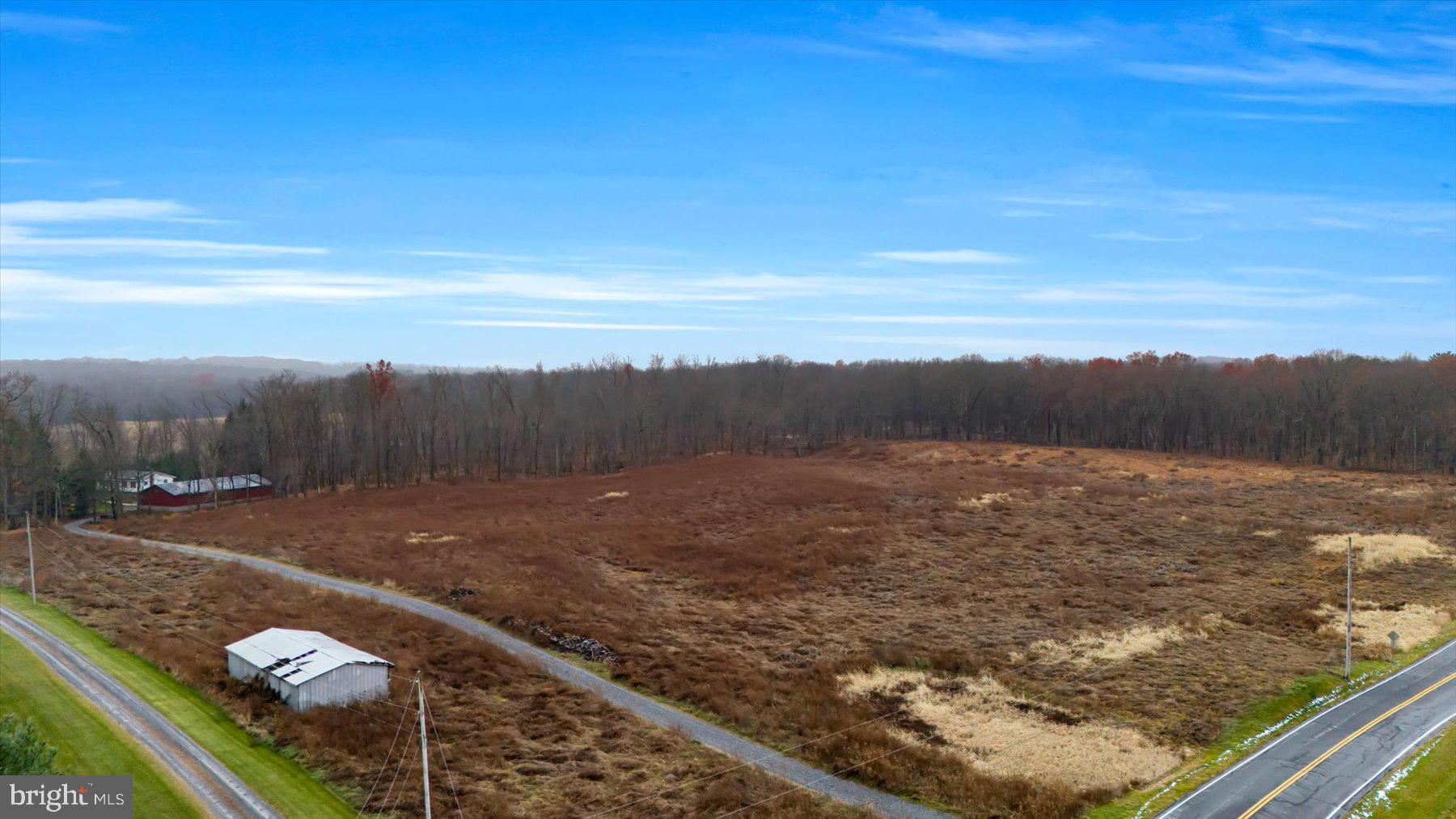 768 Dry Hollow Road Warriors Mark, PA 16877 - Photo 45 of 56 a view of a lake with a city