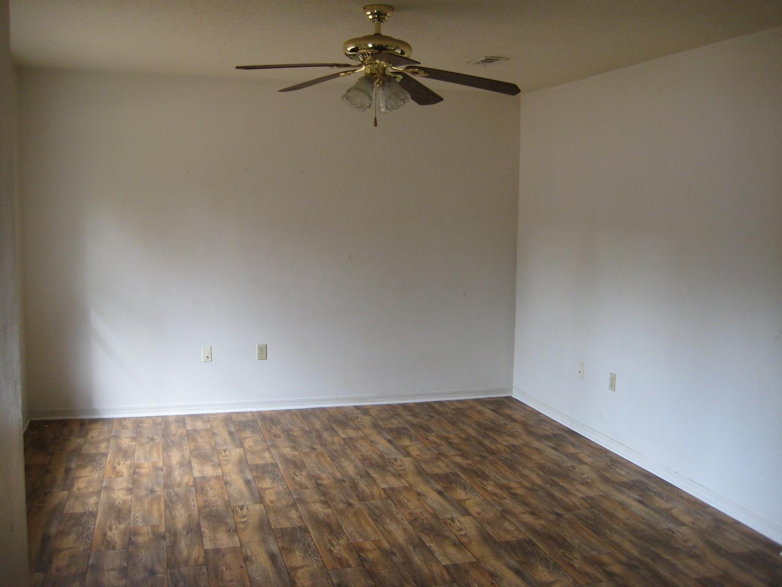 6003 Robin Road Crestview, FL 32539 - Photo 2 of 17 a view of a room with an empty space and a window