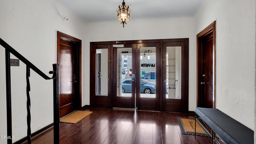 128 Lime Avenue, Unit 14 Long Beach, CA 90802 - Photo 26 of 31 a view of entryway with wooden floor