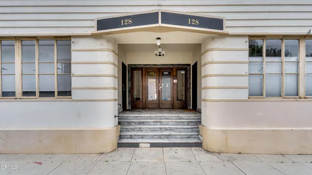 a front view of a house with a outdoor window