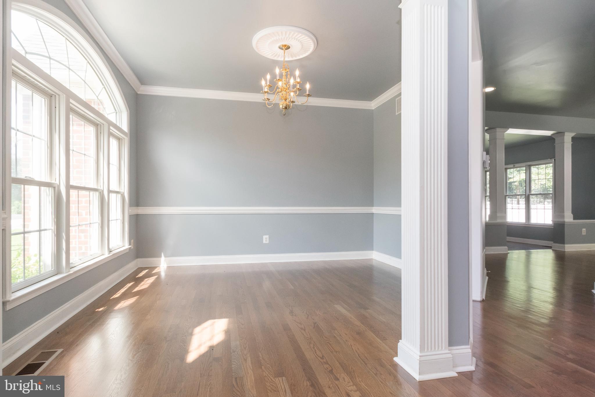 15 Johnson Road Pasadena, MD 21122 - Photo 12 of 40 wooden floor in an empty room with a window