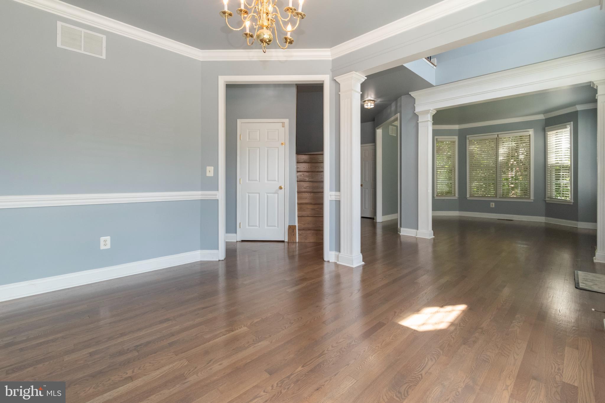 15 Johnson Road Pasadena, MD 21122 - Photo 13 of 40 wooden floor in an empty room with a window