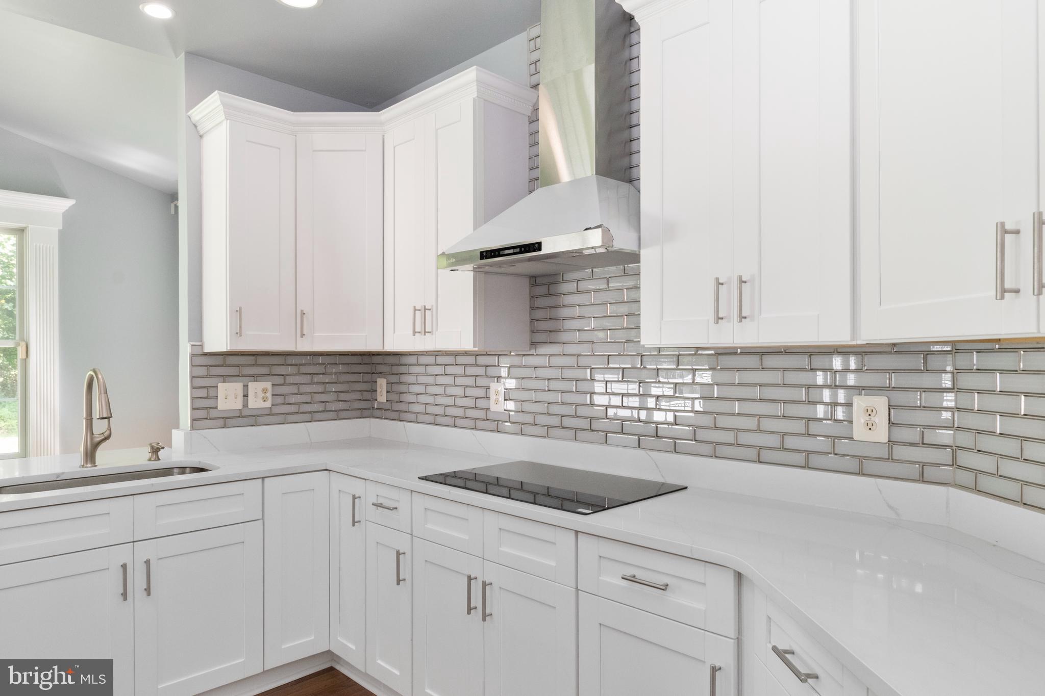 15 Johnson Road Pasadena, MD 21122 - Photo 18 of 40 a kitchen with a sink and cabinets