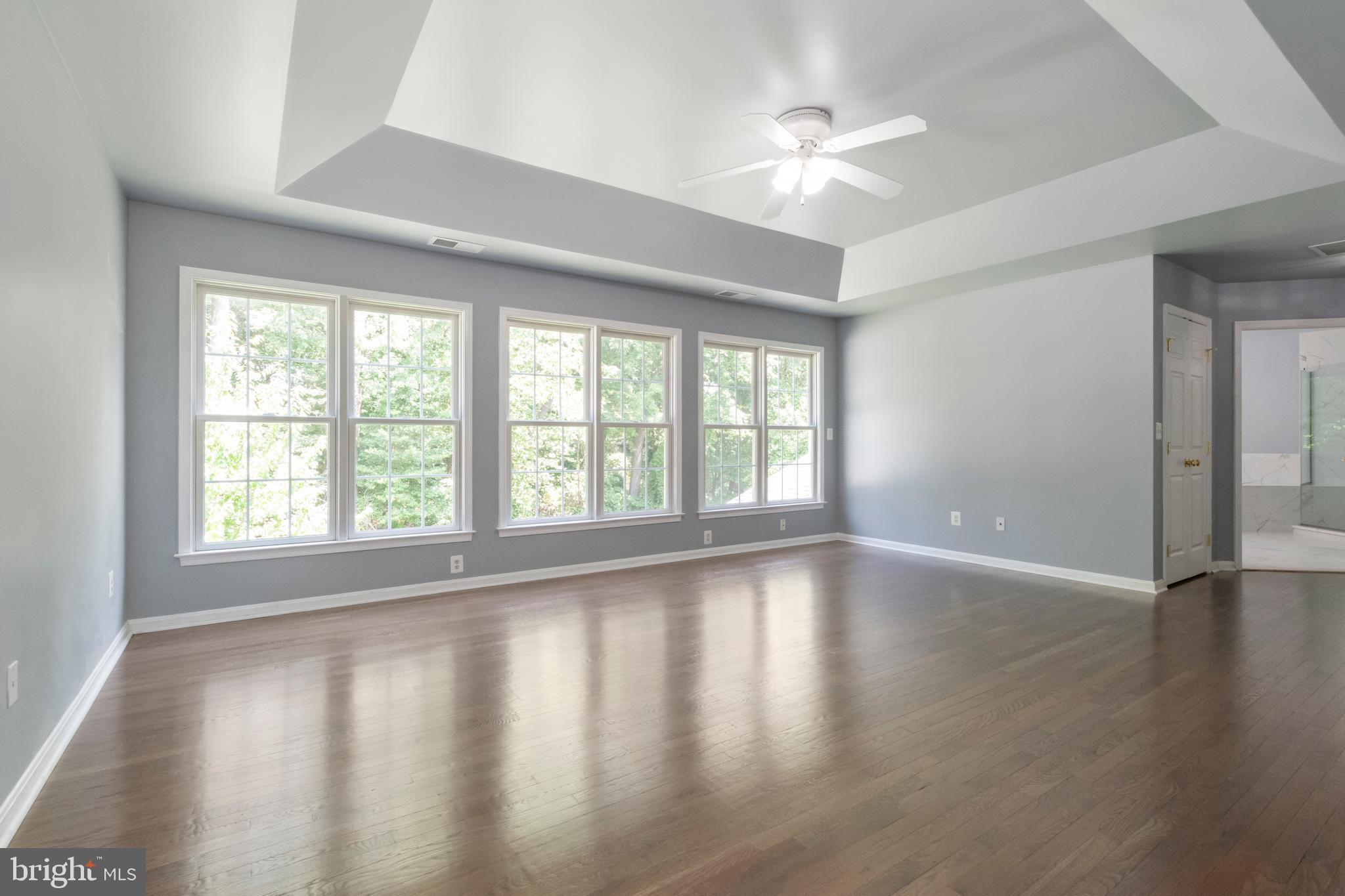 15 Johnson Road Pasadena, MD 21122 - Photo 27 of 40 wooden floor in an empty room with a window