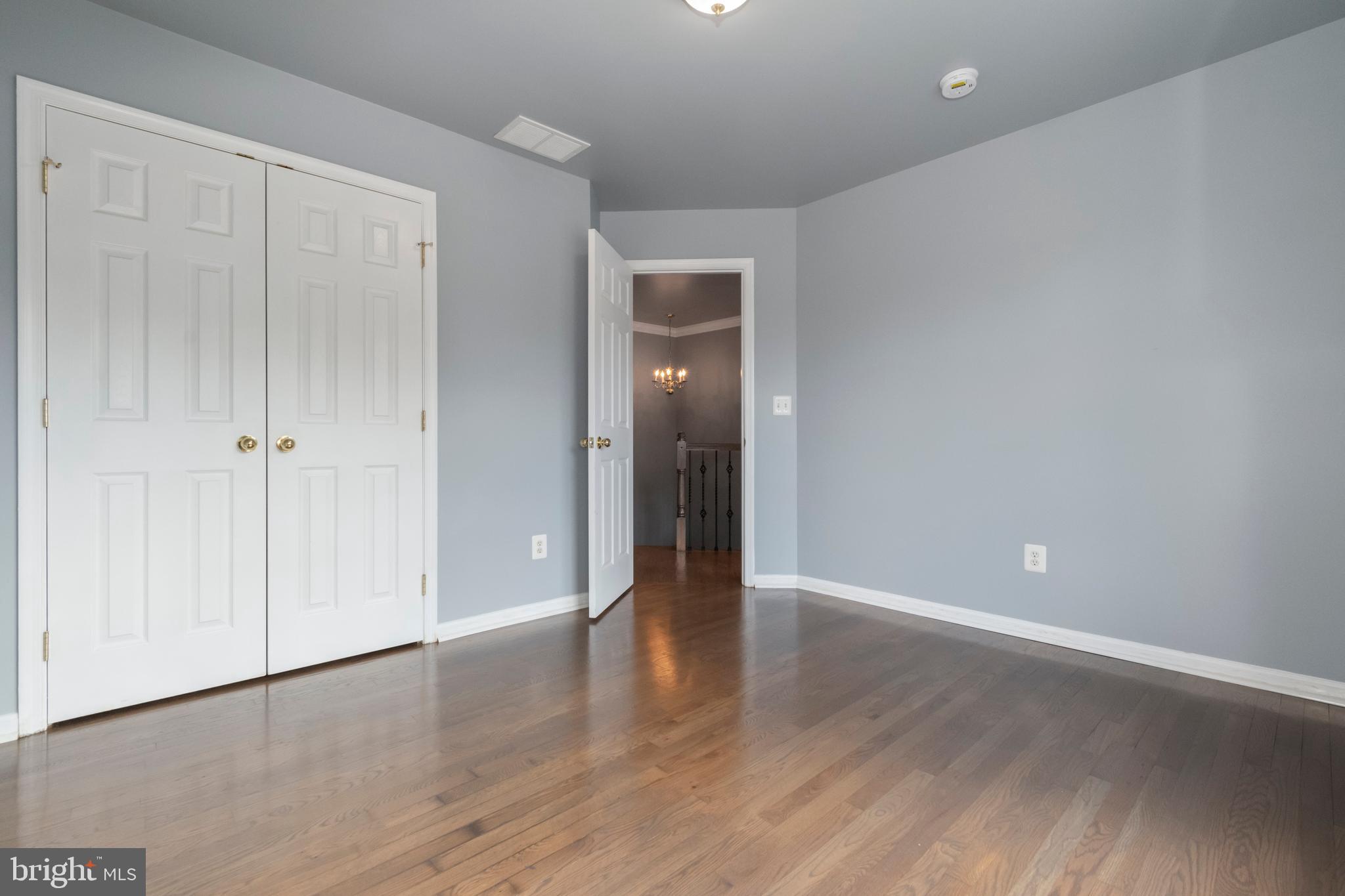 15 Johnson Road Pasadena, MD 21122 - Photo 33 of 40 a view of an empty room with wooden floor