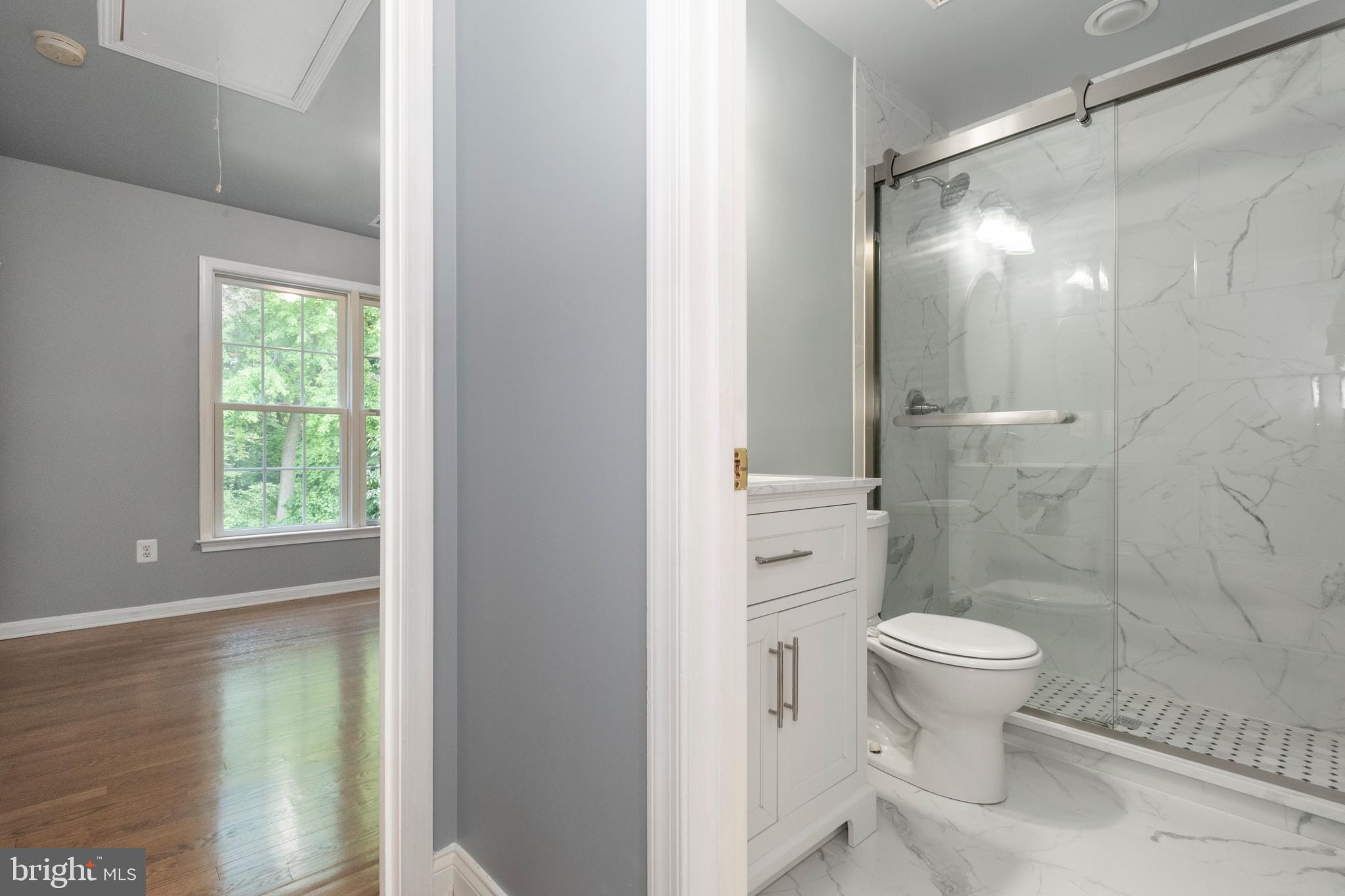 15 Johnson Road Pasadena, MD 21122 - Photo 36 of 40 a bathroom with a shower and a toilet