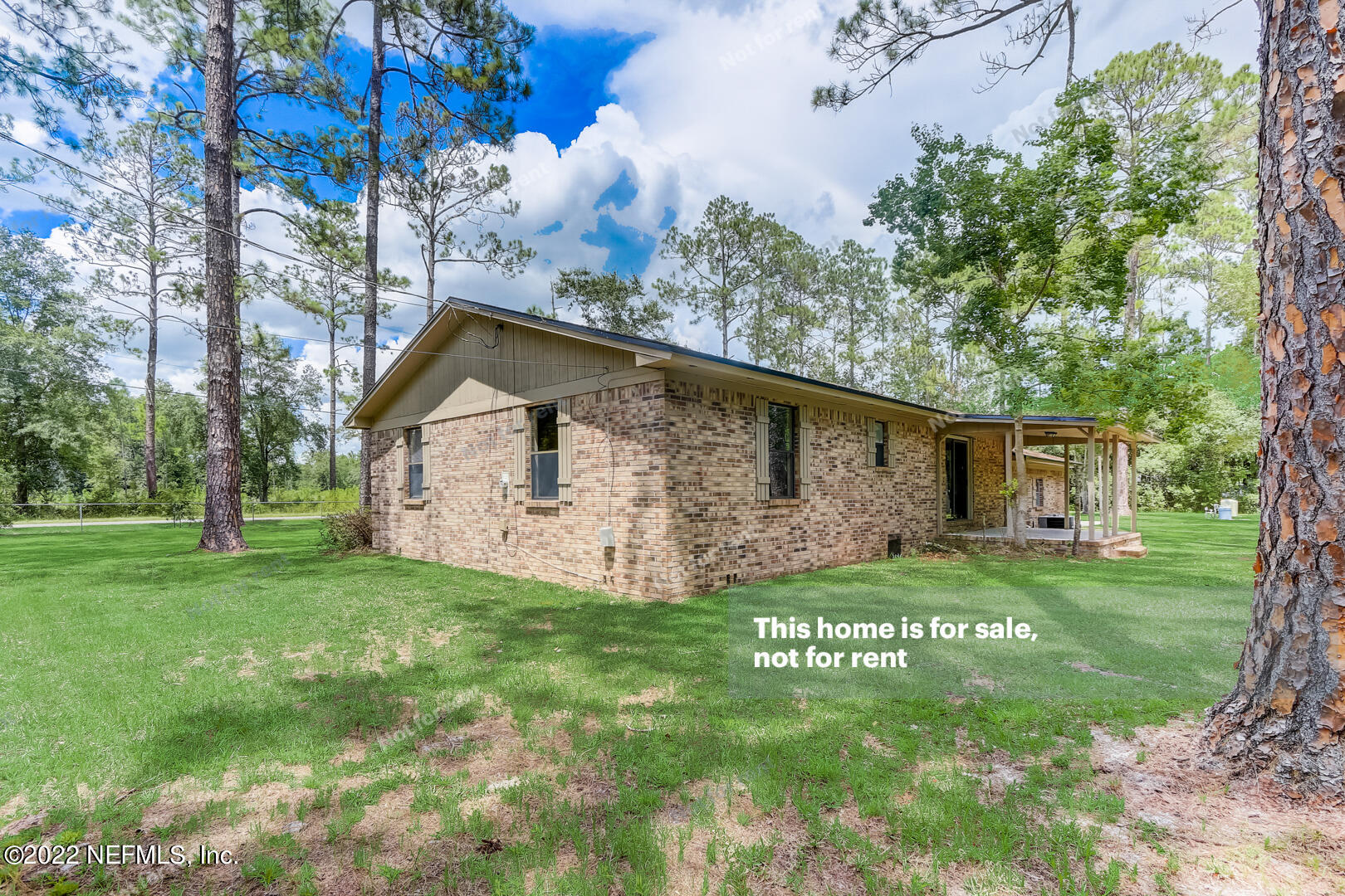 12348 Old Plank Road Jacksonville, FL 32220 - Photo 12 of 25 a view of a house with a yard