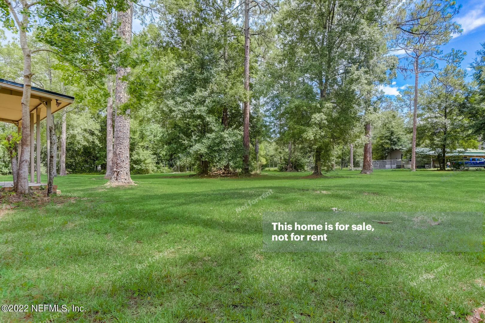 12348 Old Plank Road Jacksonville, FL 32220 - Photo 14 of 25 a view of grassy field with benches