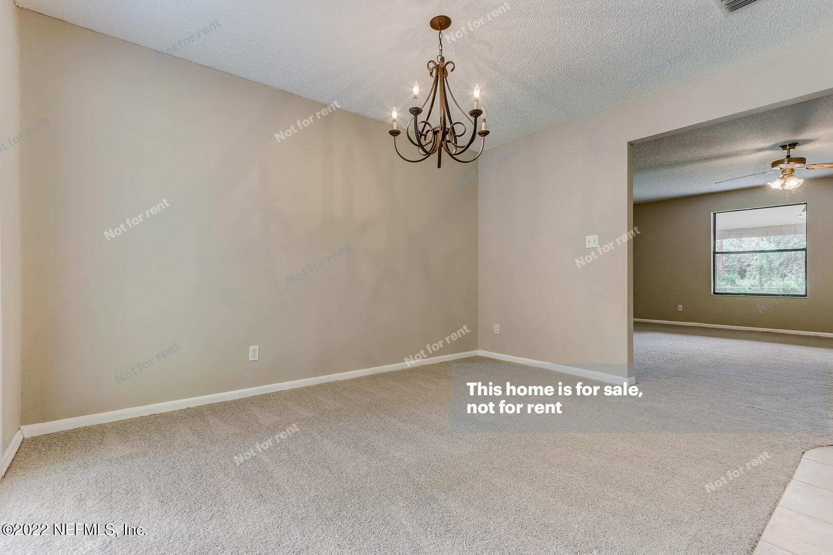 12348 Old Plank Road Jacksonville, FL 32220 - Photo 17 of 25 a view of a chandelier fan in a room