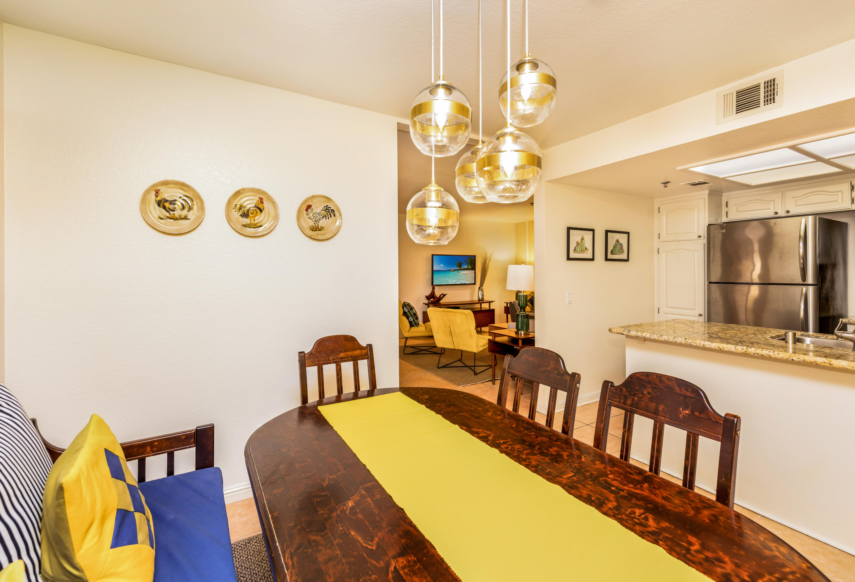 500 East Amado Road, Unit 512 Palm Springs, CA 92262 - Photo 15 of 37 a view of a dining room with furniture