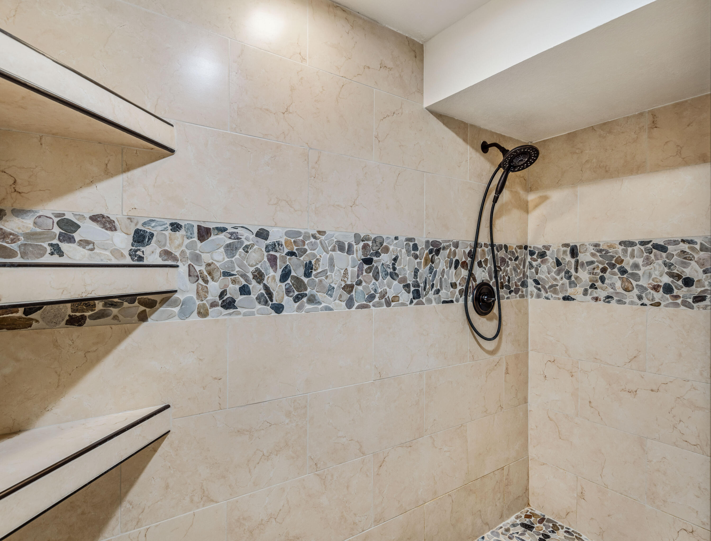 500 East Amado Road, Unit 512 Palm Springs, CA 92262 - Photo 23 of 37 a bathroom with a bathtub and shower