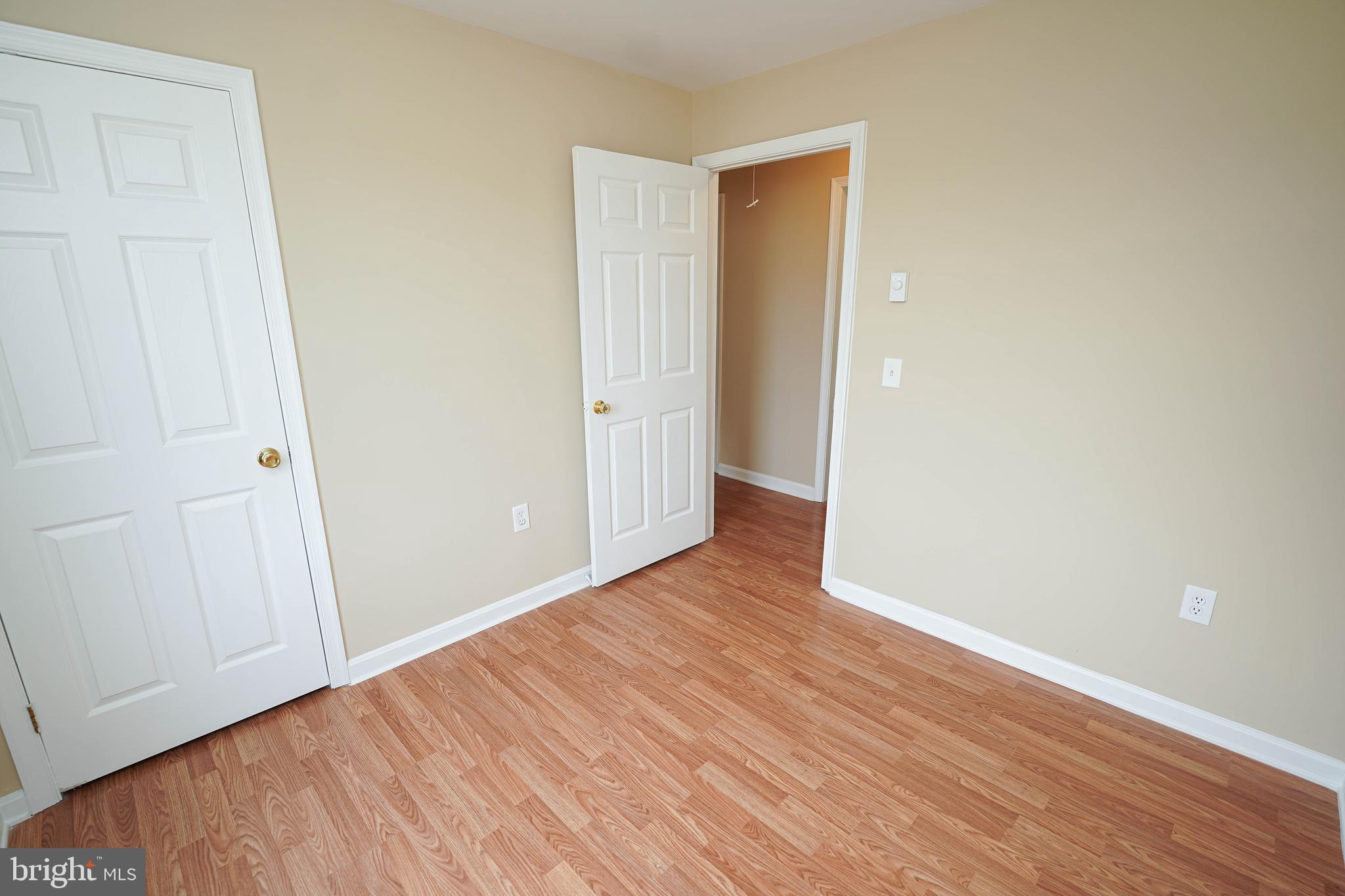 7526 Bethel Road Willards, MD 21874 - Photo 22 of 34 a view of an empty room with wooden floor