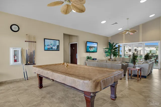 a living room with dining table