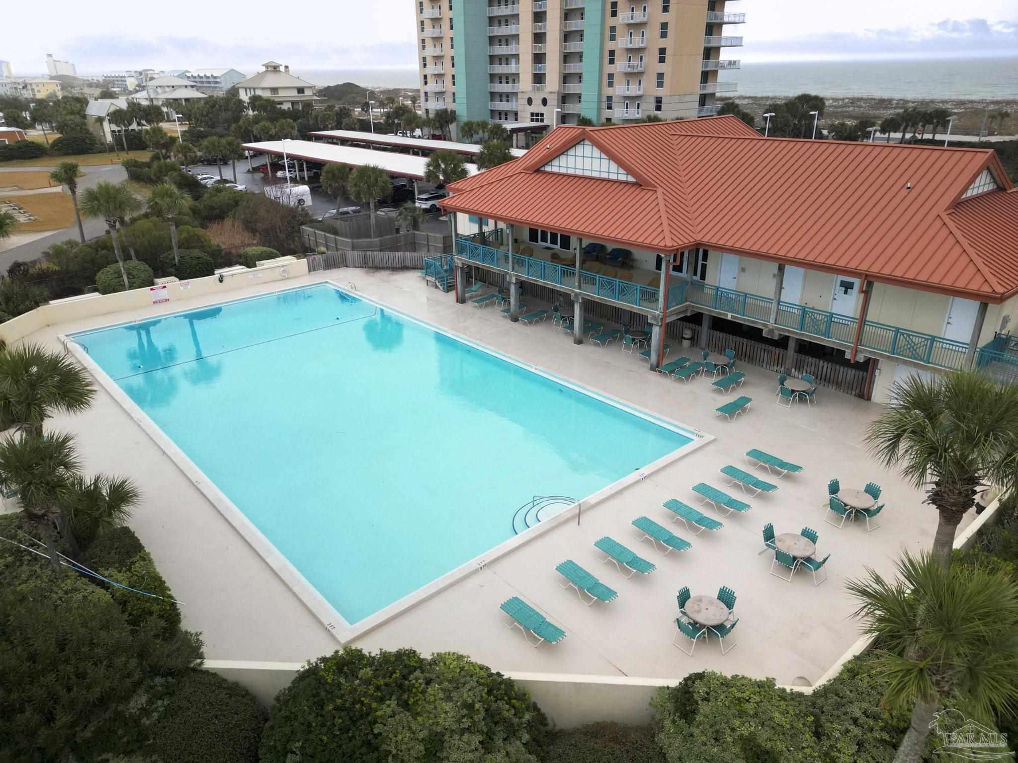 900 Fort Pickens Road, Unit 813 Pensacola Beach, FL 32561 - Photo 30 of 30 an aerial view of a house with a swimming pool