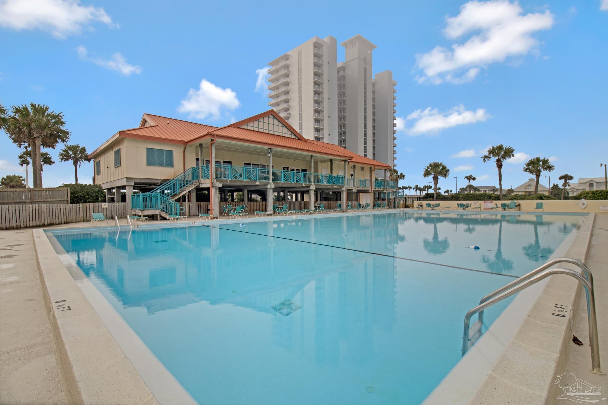 900 Fort Pickens Road, Unit 813 Pensacola Beach, FL 32561 - Photo 5 of 30 a view of a lake with a building and outdoor space