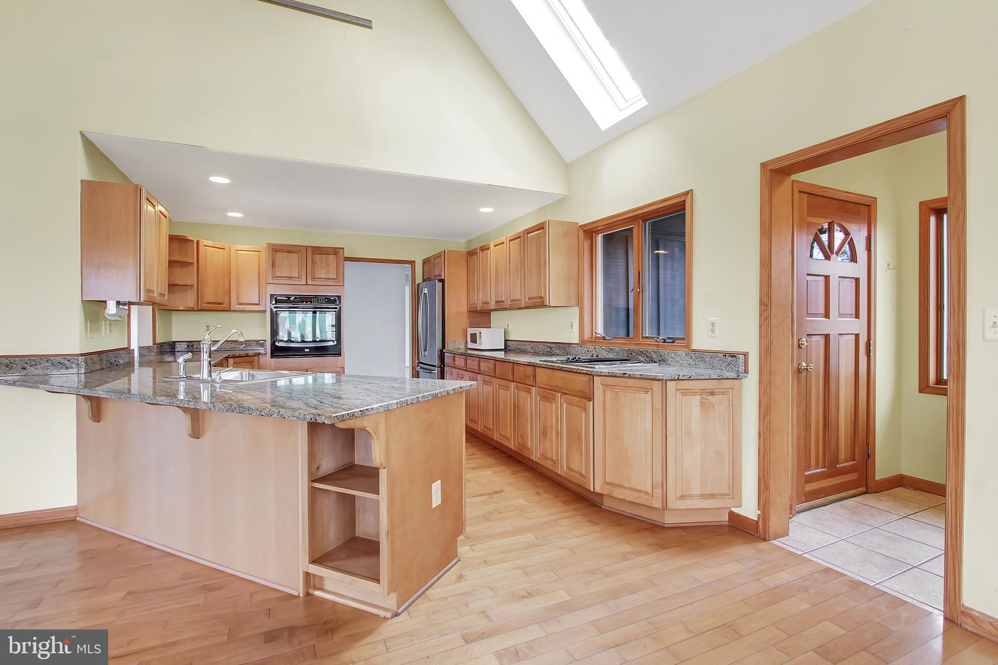 16611 Jm Pearce Road Monkton, MD 21111 - Photo 4 of 94 Open kitchen with granite counters