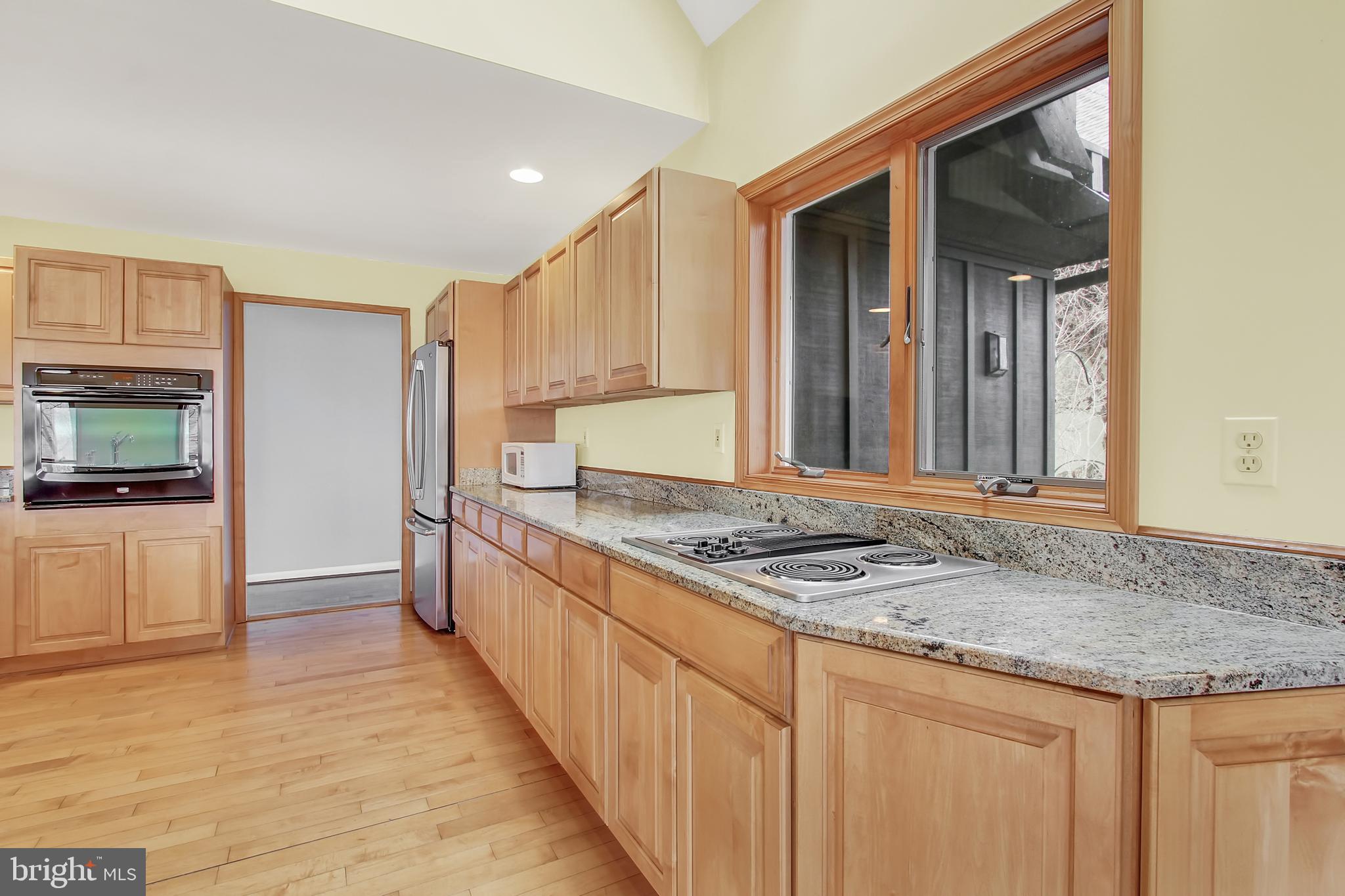 16611 Jm Pearce Road Monkton, MD 21111 - Photo 5 of 94 Kitchen offering granite and stainless appliances