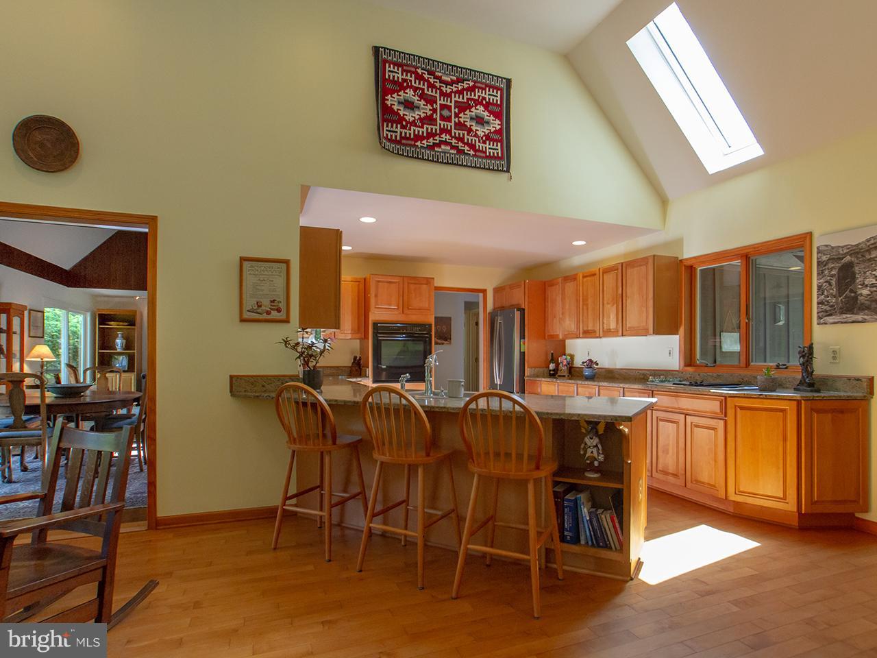 16611 Jm Pearce Road Monkton, MD 21111 - Photo 58 of 94 Kitchen with angled bar and seating