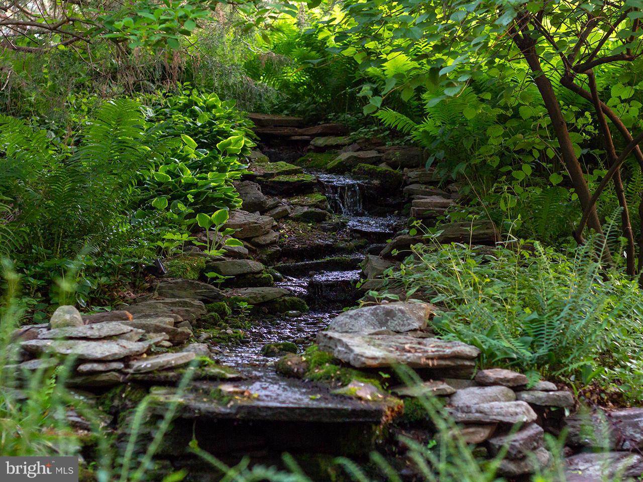 16611 Jm Pearce Road Monkton, MD 21111 - Photo 9 of 94 Natural stone waterfall and koi pond