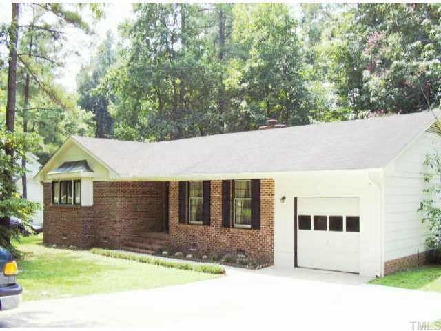 7617 Leesville Road Raleigh, NC 27613 - Photo 1 of 1 a front view of a house with a yard