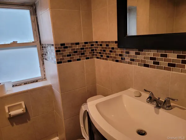 a bathroom with a sink and a tub