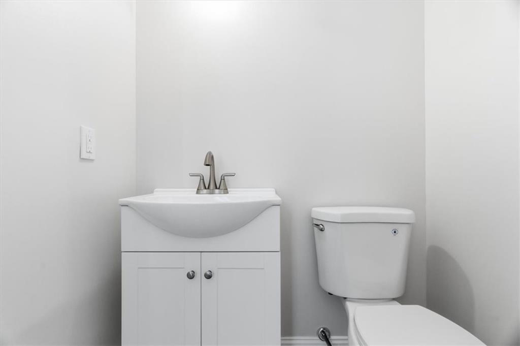 84 Hall Avenue Pittsburgh, PA 15205 - Photo 14 of 34 a bathroom with a toilet a sink and mirror