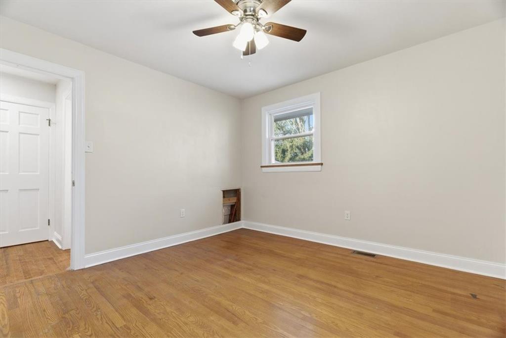 84 Hall Avenue Pittsburgh, PA 15205 - Photo 20 of 34 wooden floor in an empty room with a window