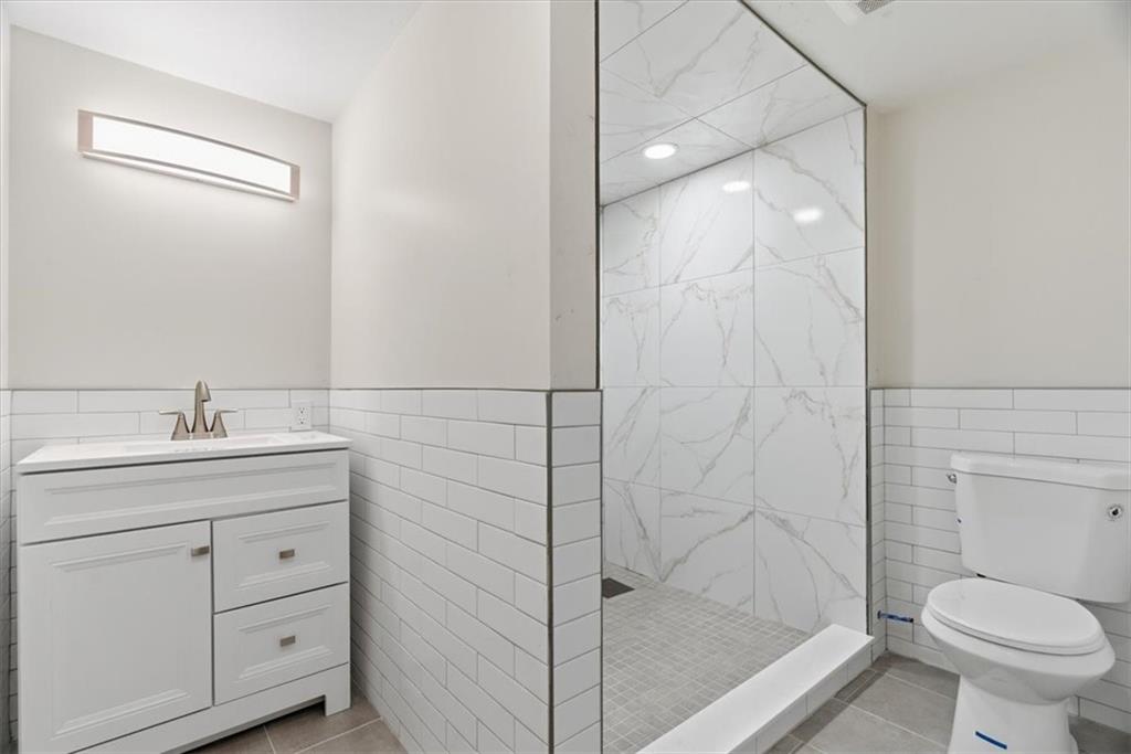 84 Hall Avenue Pittsburgh, PA 15205 - Photo 25 of 34 a bathroom with a sink toilet and shower