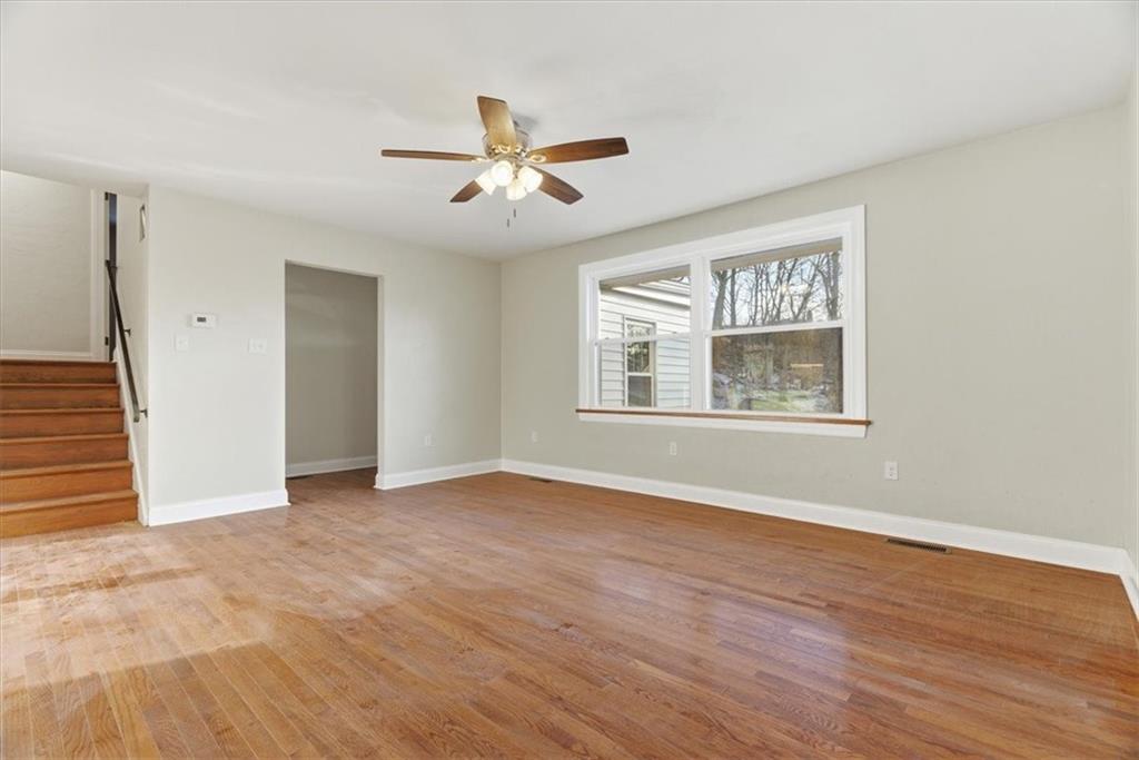 84 Hall Avenue Pittsburgh, PA 15205 - Photo 4 of 34 a view of an empty room with wooden floor and a window