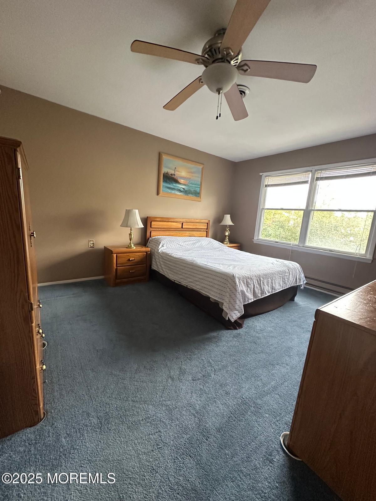 53 Sycamore Access Road Manahawkin, NJ 08050 - Photo 17 of 39 a bedroom with bed and window