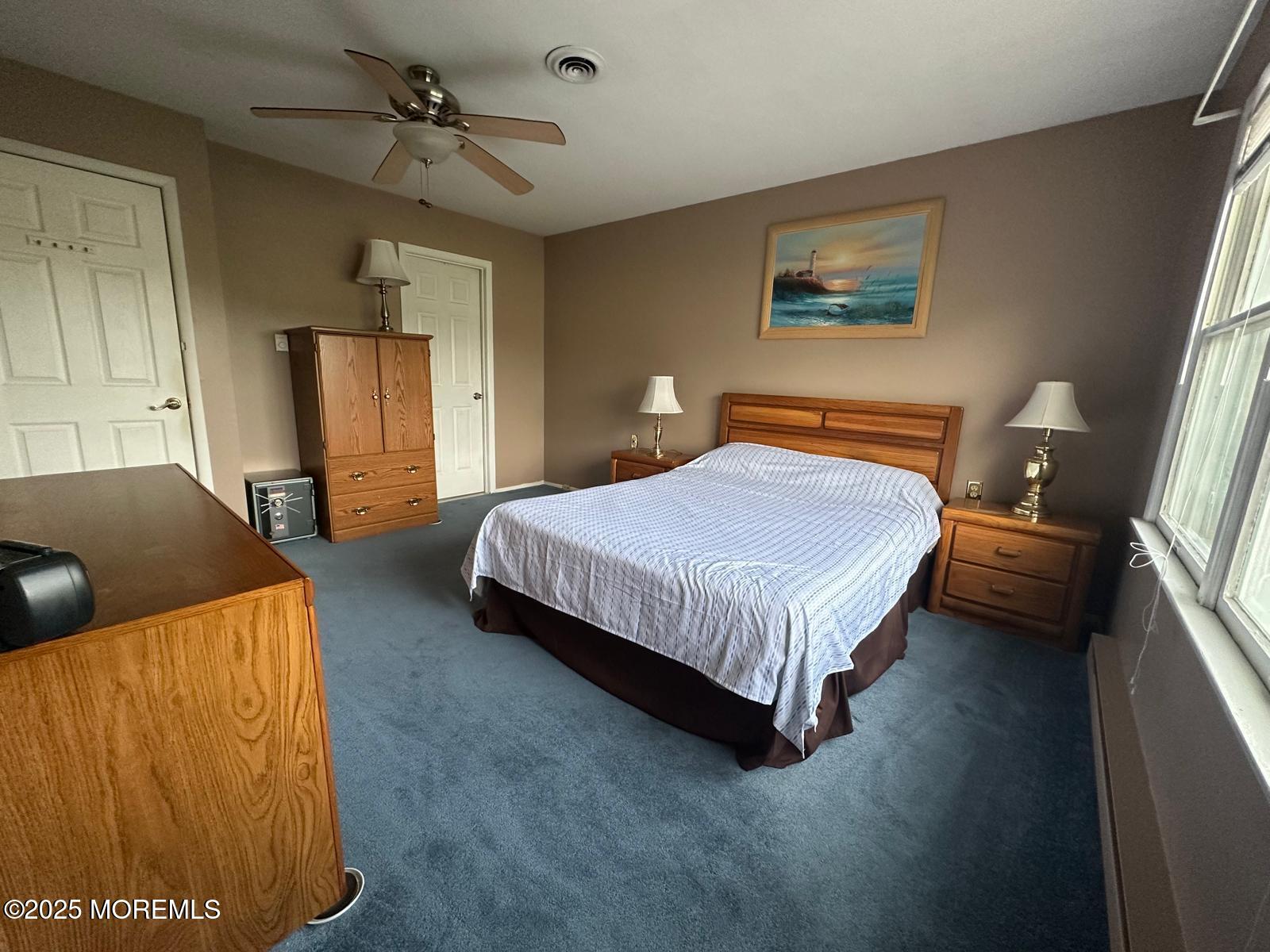 53 Sycamore Access Road Manahawkin, NJ 08050 - Photo 20 of 39 a bedroom with a bed and window