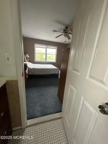 a bathroom with a sink and shower