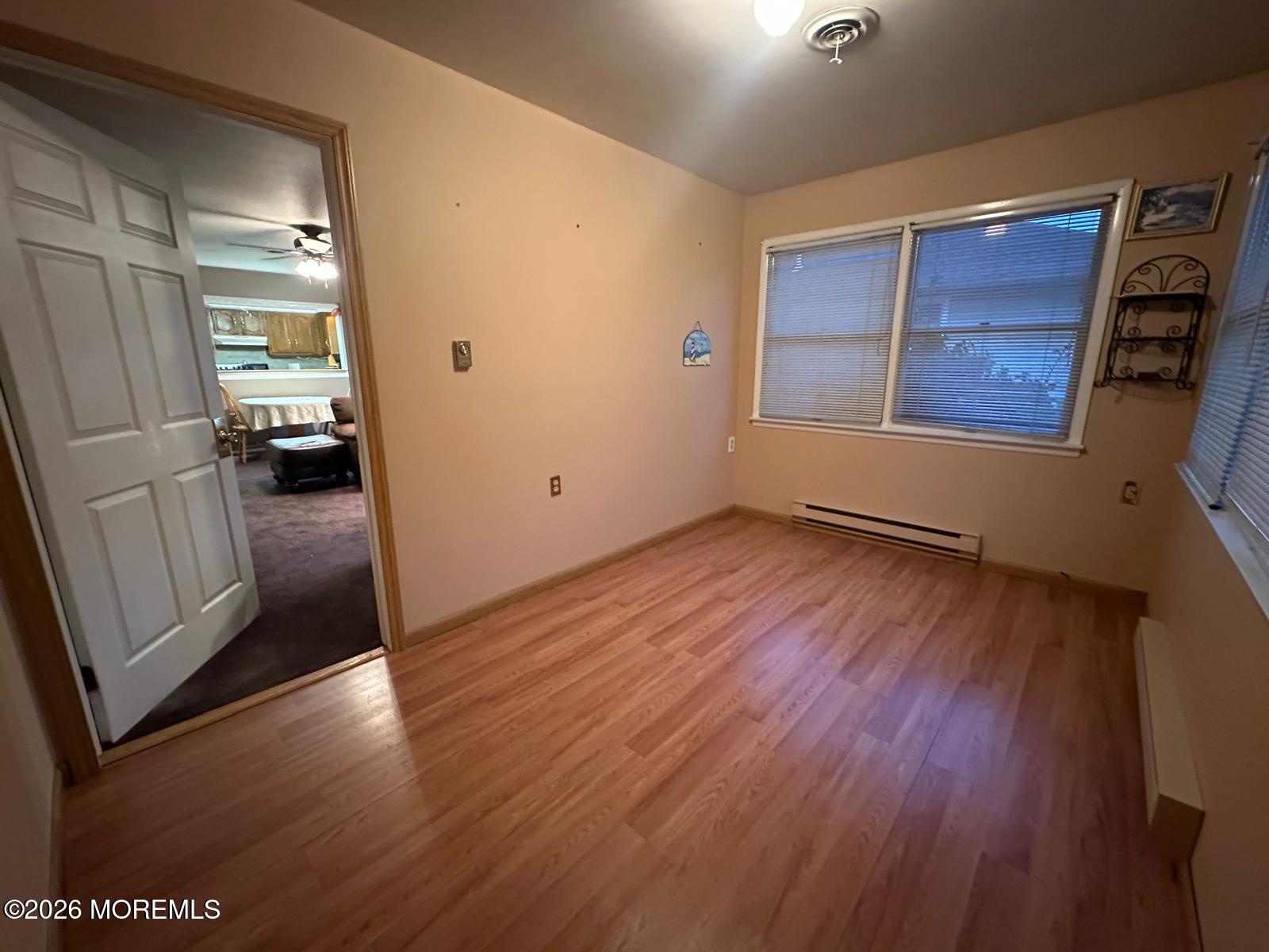 53 Sycamore Access Road Manahawkin, NJ 08050 - Photo 29 of 34 a view of a car park from a hallway