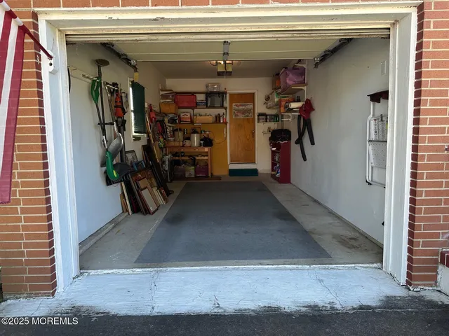 a view of a garage with storage