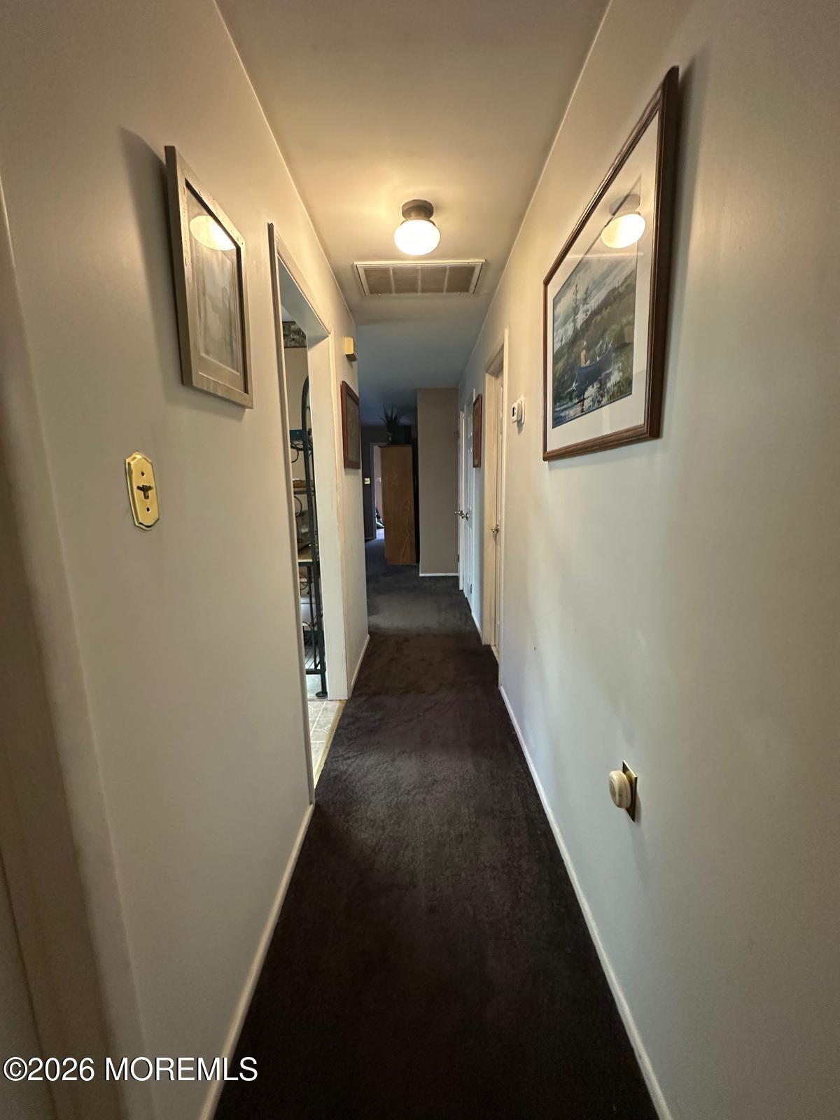 53 Sycamore Access Road Manahawkin, NJ 08050 - Photo 3 of 34 a view of a hallway