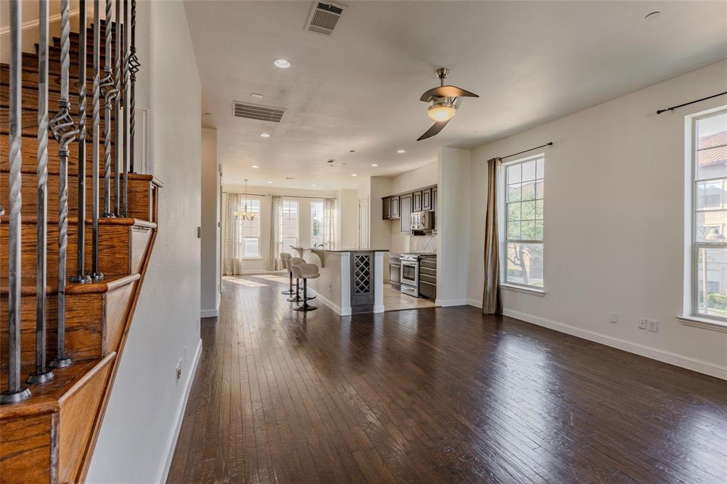 602 Arbol Irving, TX 75039 - Photo 20 of 38 a view of dining room with furniture and wooden floor