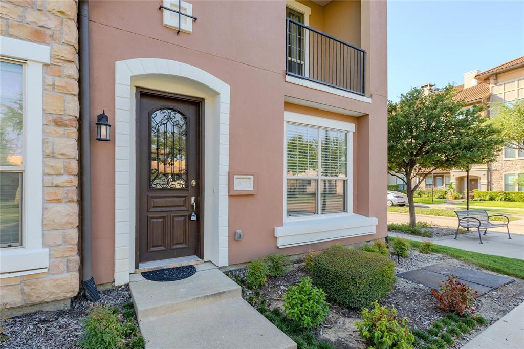 602 Arbol Irving, TX 75039 - Photo 2 of 38 a front view of a house with a yard
