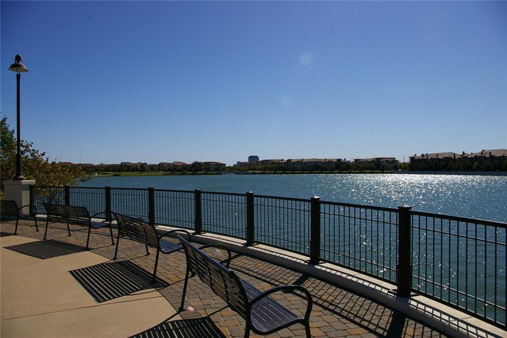 602 Arbol Irving, TX 75039 - Photo 35 of 38 a view of a balcony with wooden floor and city view