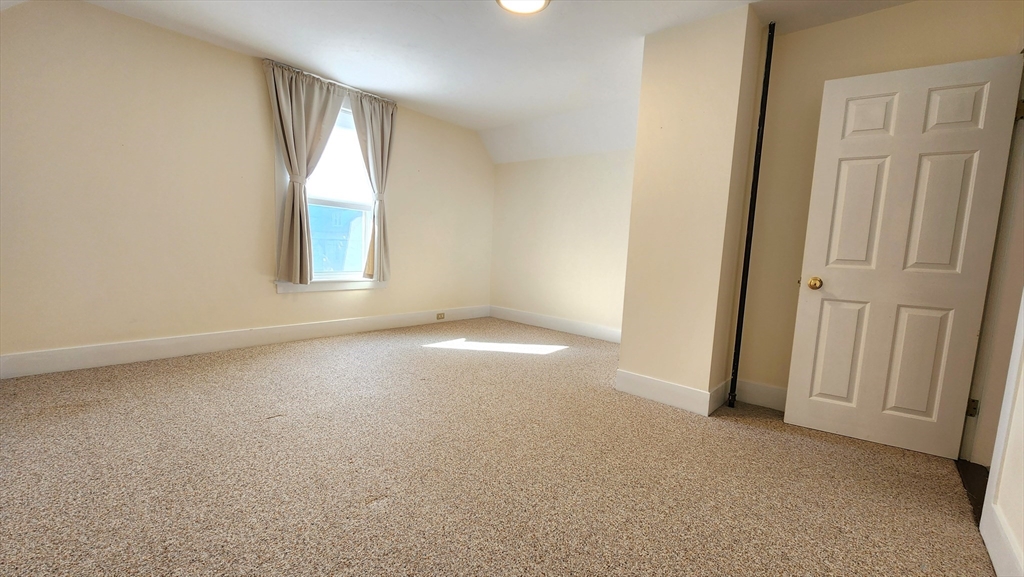 8 Fay Street, Unit 2 Westborough, MA 01581 - Photo 14 of 15 an empty room with windows and closet
