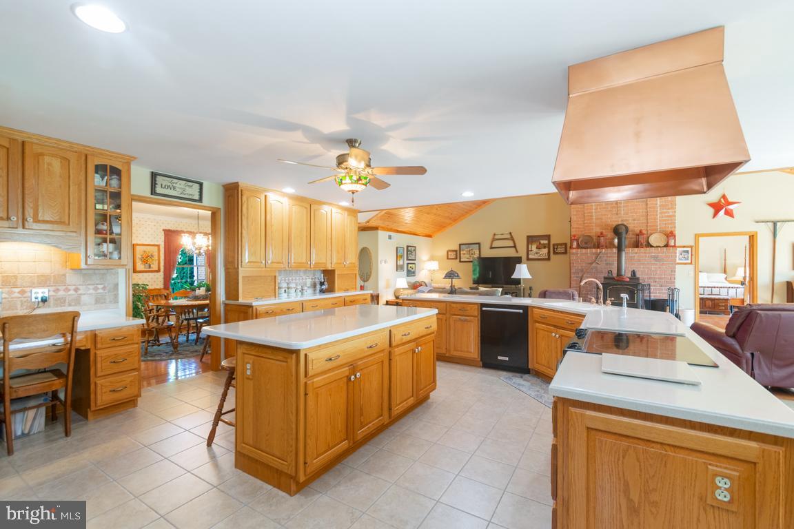 613 Hanover Pike Hampstead, MD 21074 - Photo 15 of 55 a kitchen that has a lot of cabinets in it
