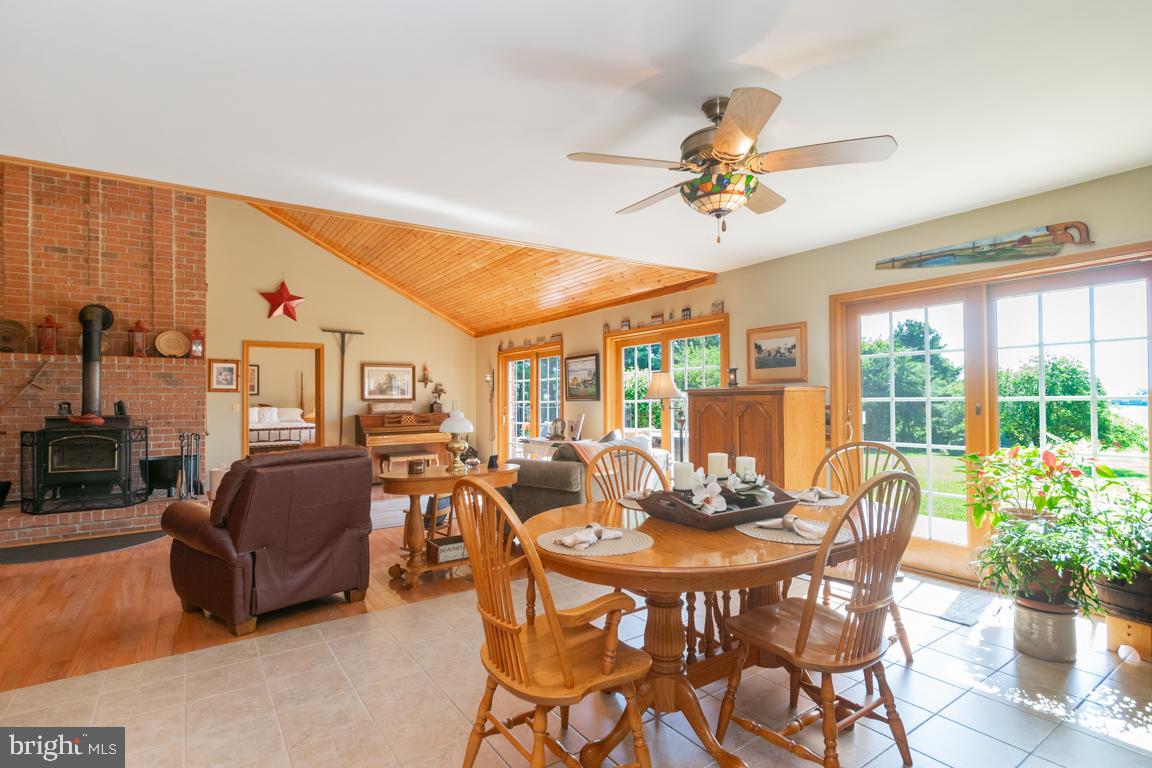 613 Hanover Pike Hampstead, MD 21074 - Photo 21 of 55 a view of a dining room with furniture window and outside view