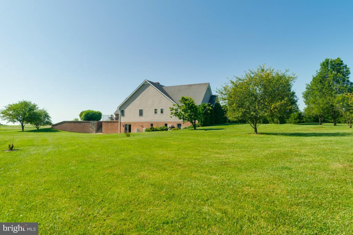 613 Hanover Pike Hampstead, MD 21074 - Photo 52 of 55 a front view of a house with garden