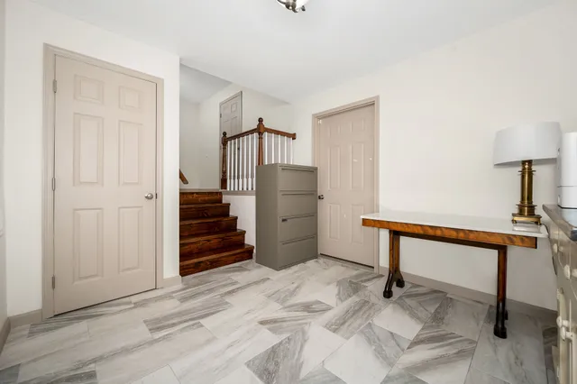 a view of a backyard with wooden floor and outdoor space
