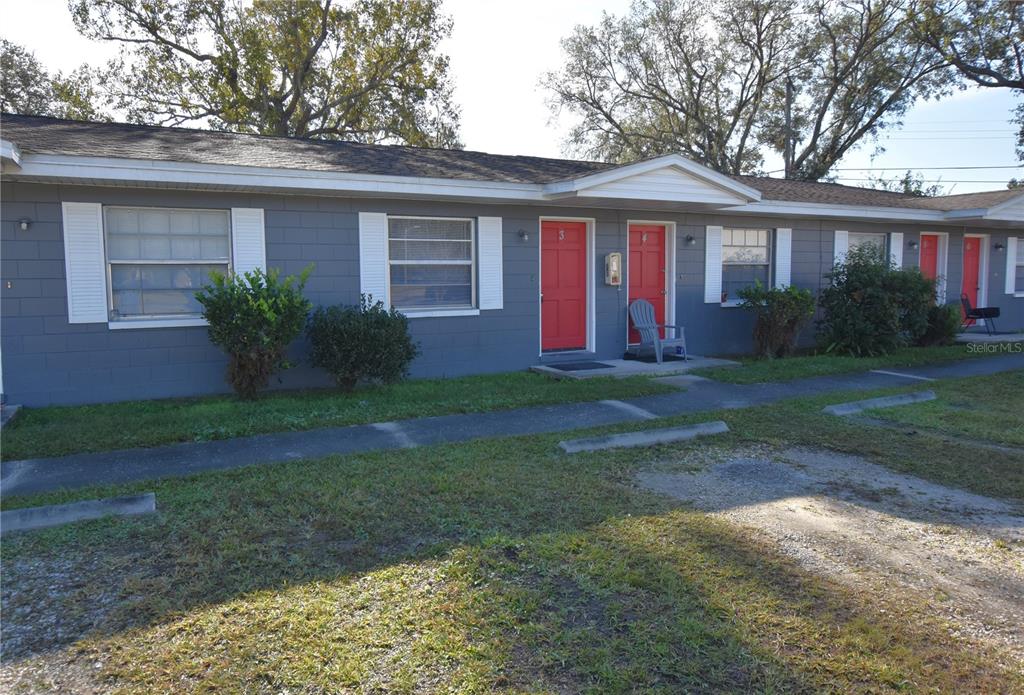 619 Robin Road, Unit 3 Lakeland, FL 33803 - Photo 17 of 17 a front view of a house with a yard