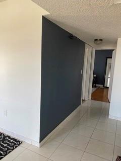 4174 Inverrary Drive, Unit 1015 Lauderhill, FL 33319 - Photo 4 of 15 a view of a hallway to rooms
