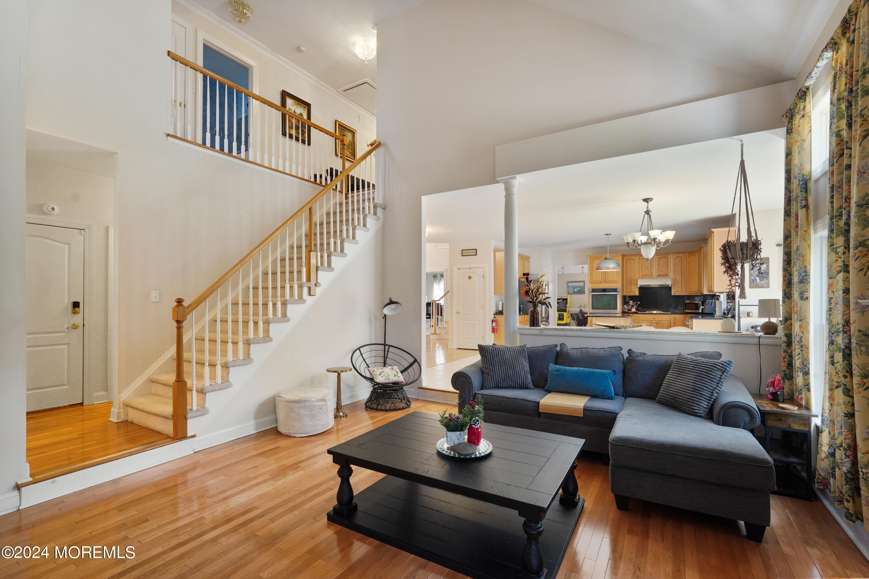 455 Iron Bridge Road Freehold, NJ 07728 - Photo 15 of 60 a living room with furniture and a table