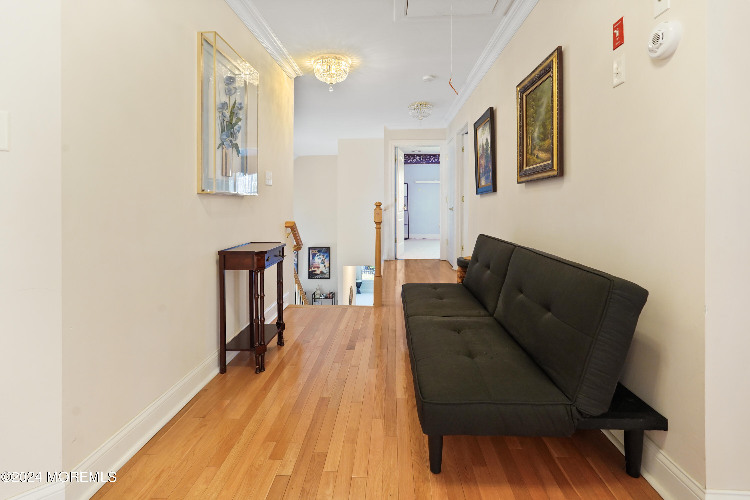 455 Iron Bridge Road Freehold, NJ 07728 - Photo 26 of 60 a living room with furniture and a wooden floor