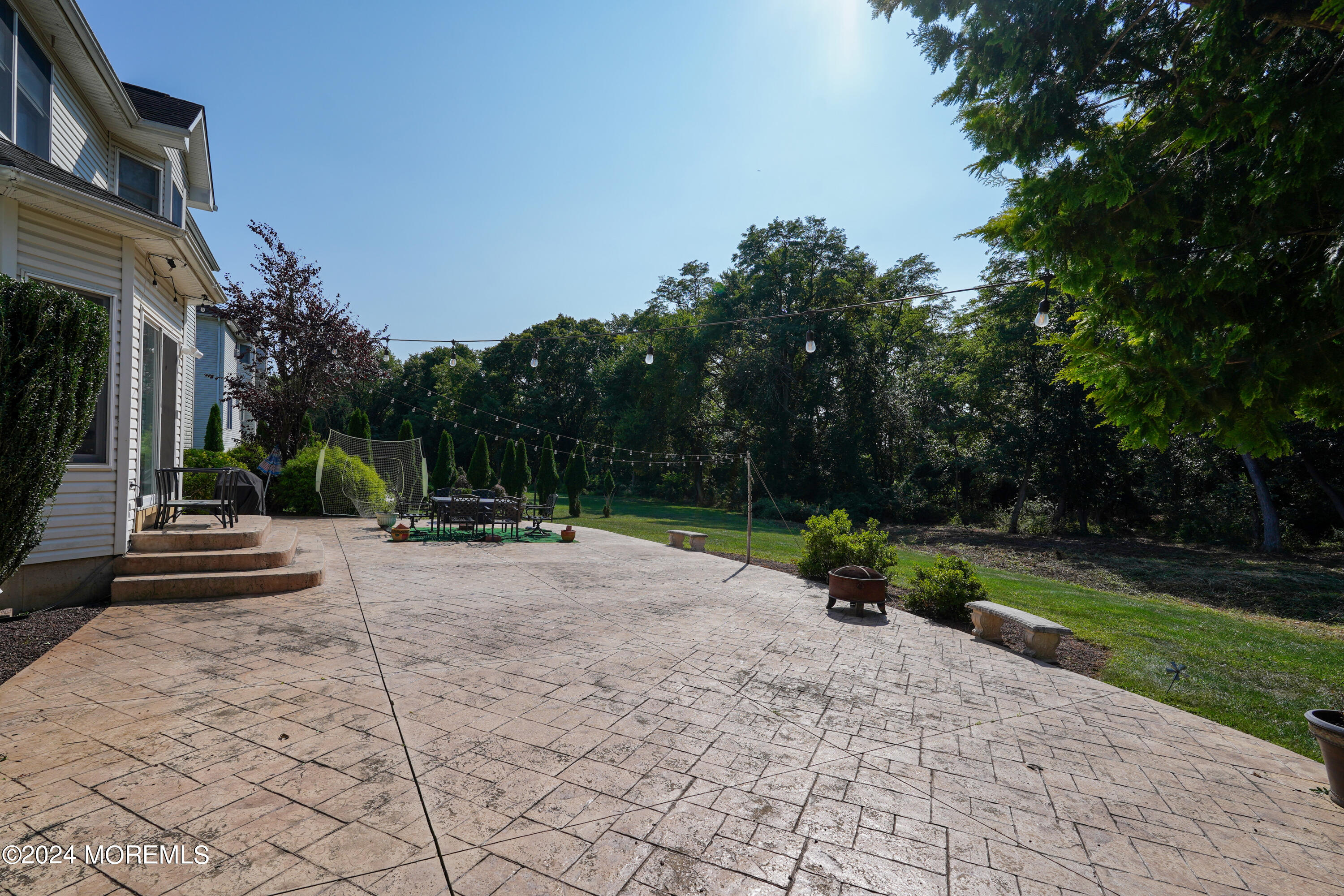 455 Iron Bridge Road Freehold, NJ 07728 - Photo 57 of 60 a view of a park with swings and slides