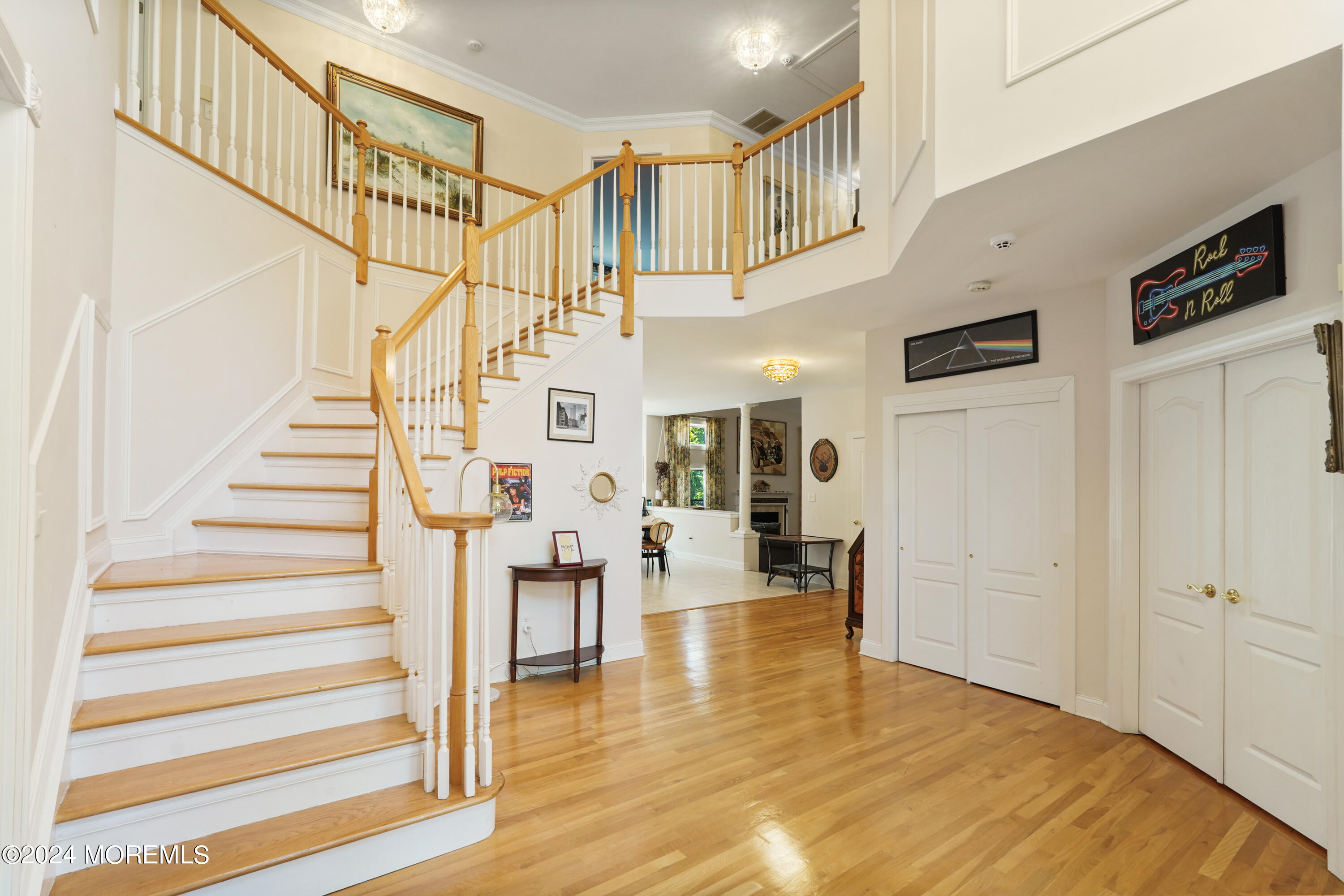 455 Iron Bridge Road Freehold, NJ 07728 - Photo 7 of 60 a view of entryway and hall with wooden floor